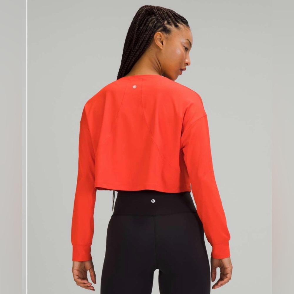 Lululemon Muscle Love Orange Long Sleeve Crop Top